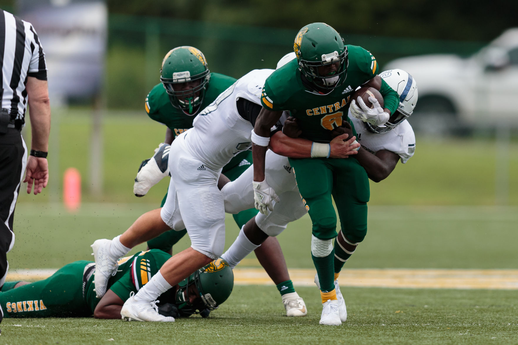 The Ragin' Bulls come from behind in the Battle of the Horns to defeat the Vikings 27-20.
